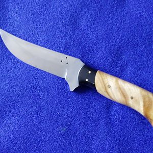 Buffalo Skinner Knife with Eucalyptus Root handles over curve backed Buffalo Horn bolsters