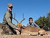 6-proud-dad-john-holds-up-alexs-fine-impala-trophy.jpg