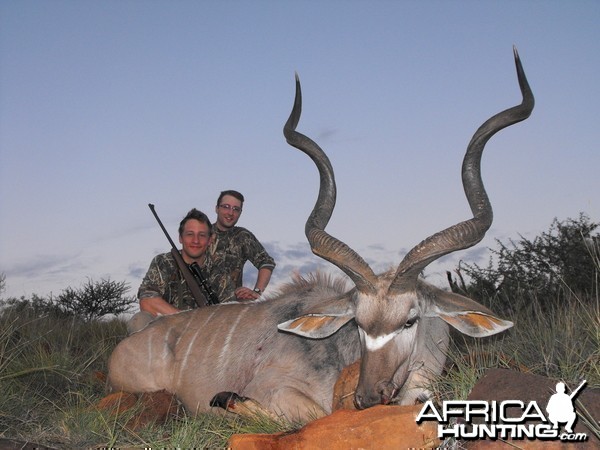 My little brother and I with his awesome Kudu bull