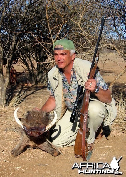 Holstein Hunting Safaris Namibia - Client with a nice Warthog