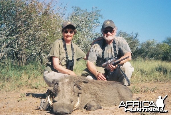 warthog with handgun