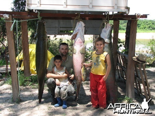 Me and my children after a fishing trip in the river Araguia, Brazil