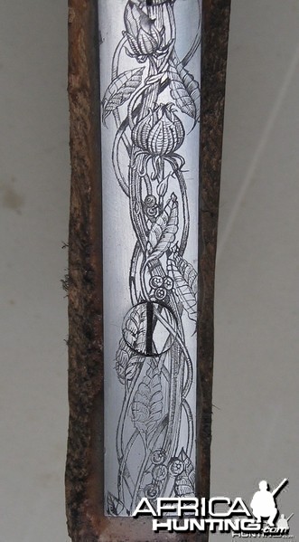 Engraved long trigger guard