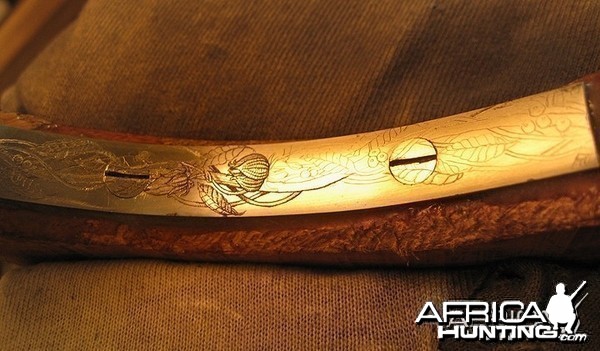 Engraved long trigger guard