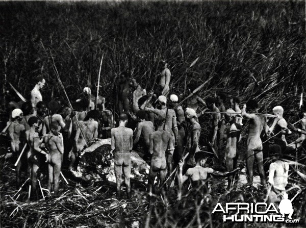 Hunting party gathering around the body of recently killed Elephant, Sudan,