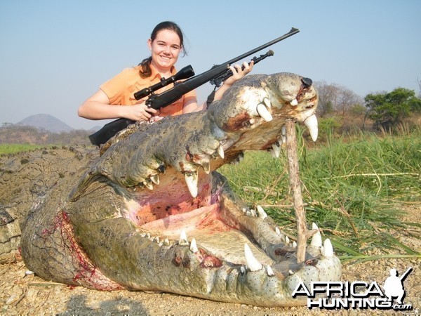 BIG crocodile with proud girl !