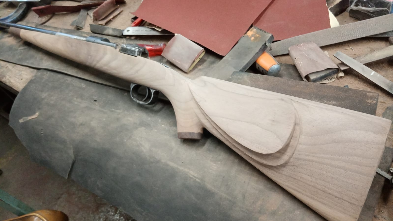 Cleaning up the butt stock and cheek piece...the stock is way too long but will be cut to size...jpg