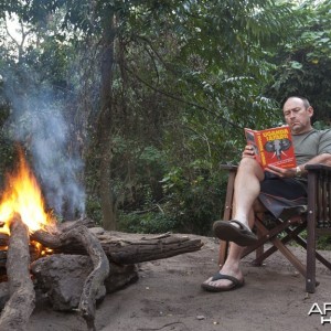 Reading Brian Herne by campfire