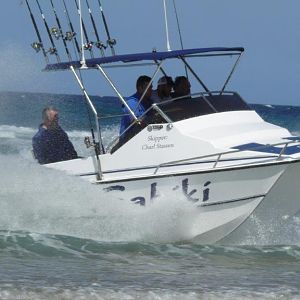 Skipper and crew coming in for beach landing.