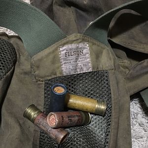 Old paper hulls and Filson brand chaps and vest