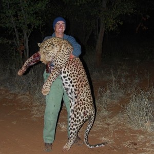 My friend PH Shaun Buffee with the leopard I shot with the 338