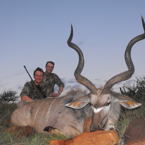 My little brother and I with his awesome Kudu bull