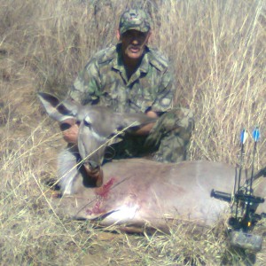 Oom Danie and his kudu cow with bow