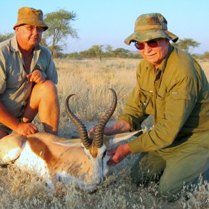 Holstein Hunting Safaris Namibia-PH Gunther Heimstadt with huge Springbuck