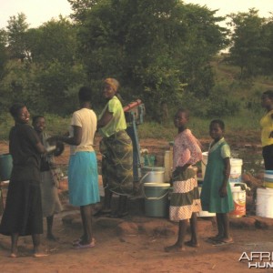 village women getting water