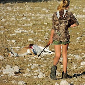 My daughter approaching the Springbok she had just taken at 160 meters. Perfect shot placement!