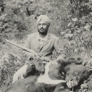 Indian hunter with a Himalayan Black Bear 1930s