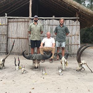 Selous style Safari pic with PH's Aart van den Brink & Dean with Marromeu Safaris