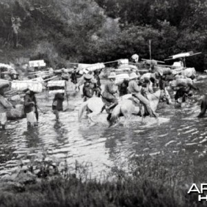 Theodore Roosevelt, the safari fording a stream