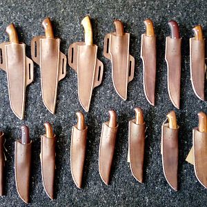 Hunting Knives with their Sheaths on