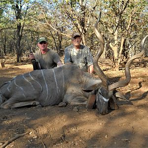 a friend and i with his kudu bull