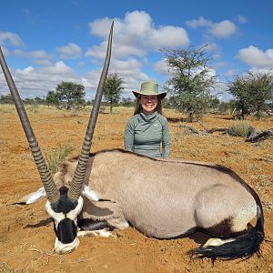 lady hunter and gemsbok