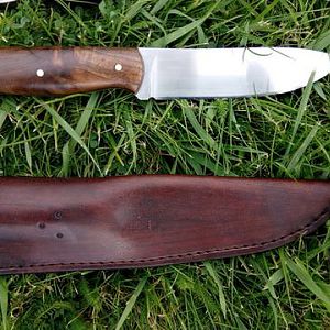 Cmpanion knife with walnut handles from the same blank