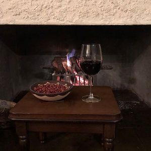 Warm cozy fire, freshly roasted peanuts and a nice glass of red