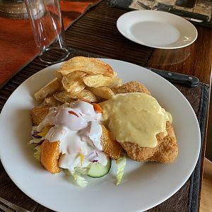 Breaded chicken cutlet, pommes frites, salad with buttermilk dressing