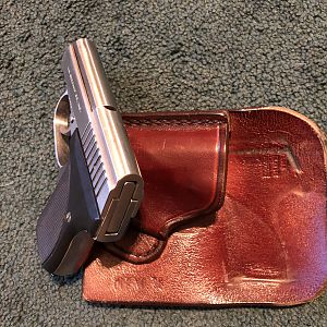 .32 Seecamp semi-automatic Pistol and its wallet holster