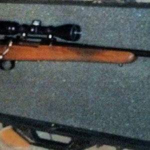 .338 Winchester Magnum rifle built on an FN Mauser action with a straight stock and a Douglas barrel