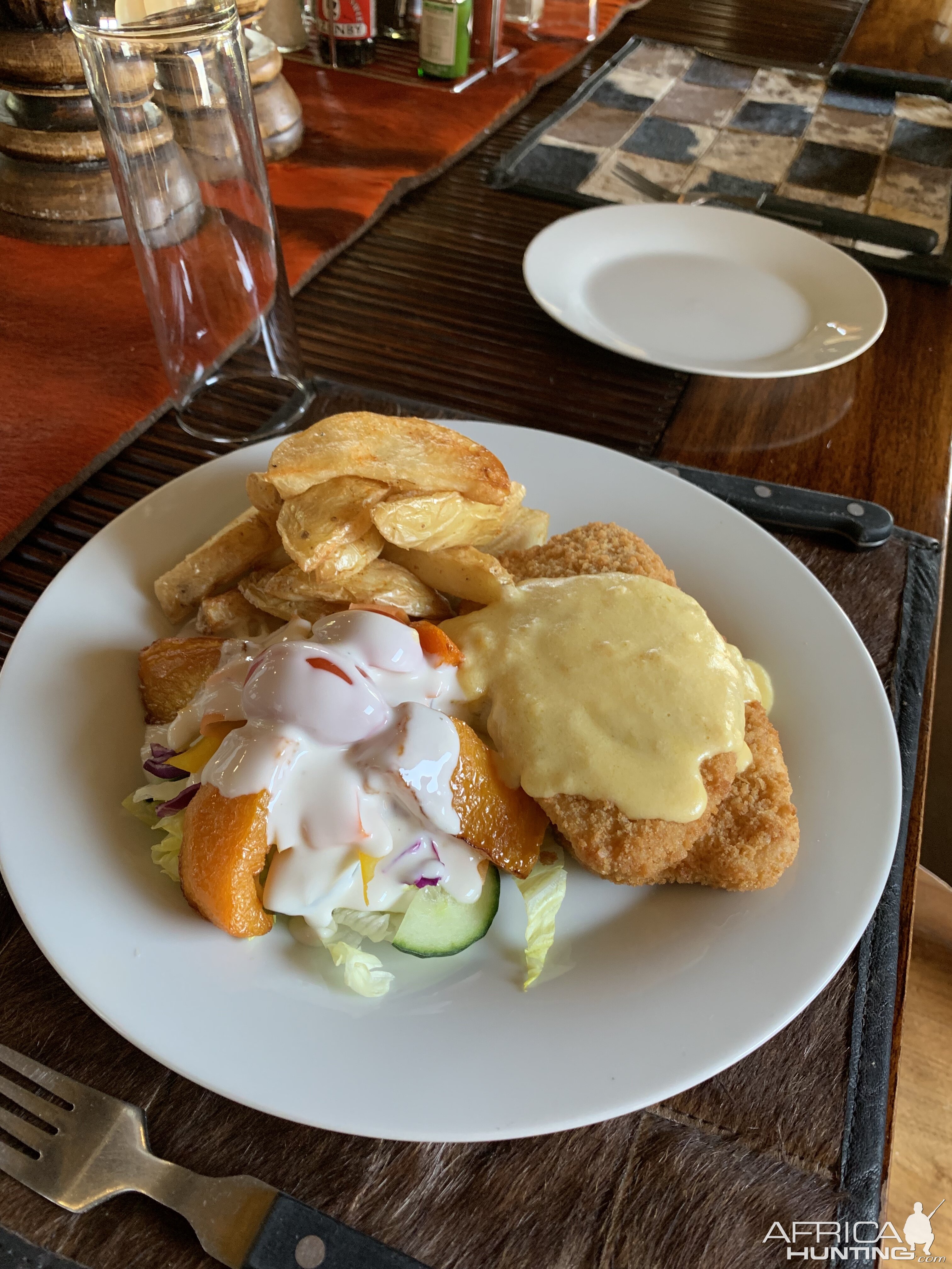 Breaded chicken cutlet, pommes frites, salad with buttermilk dressing