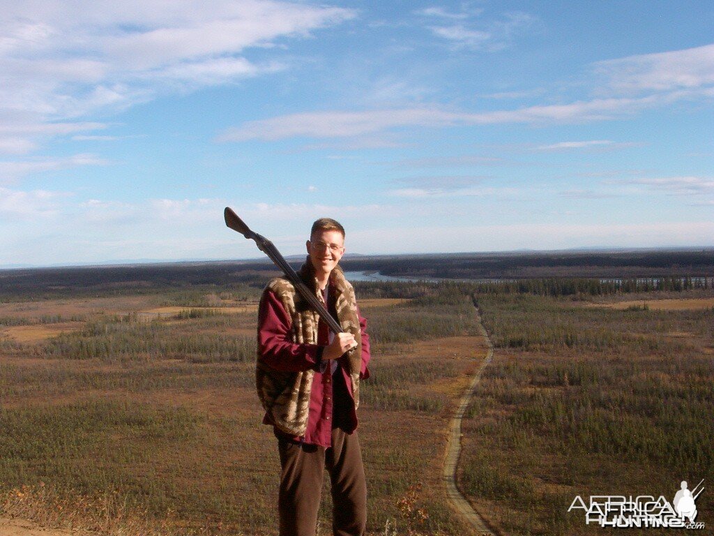 By a River in Alaska with my trusty 12 gauge