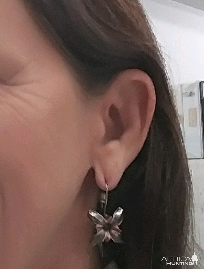 Earrings Made From Recovered Pistol Bullets