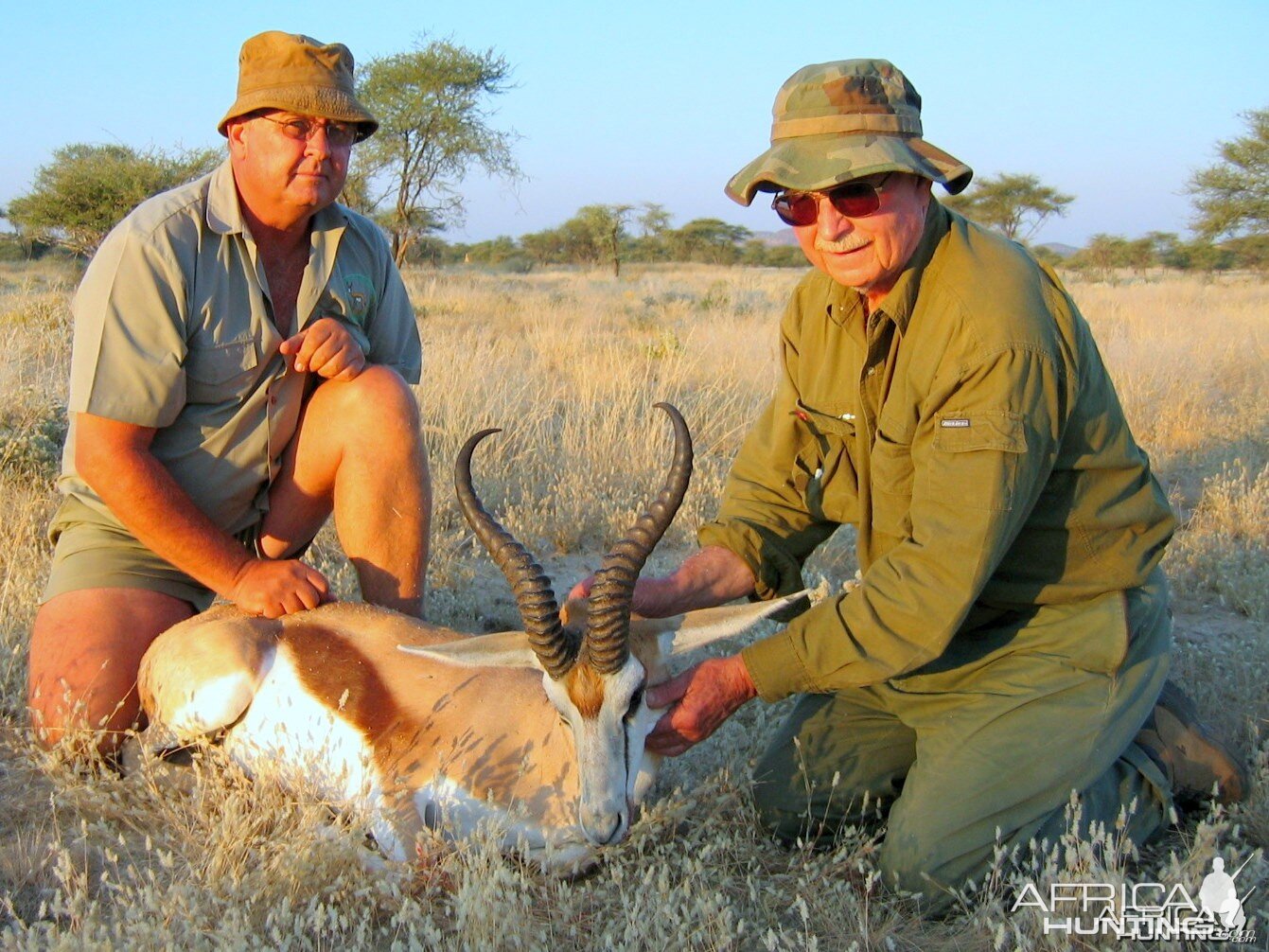 Holstein Hunting Safaris Namibia-PH Gunther Heimstadt with huge Springbuck