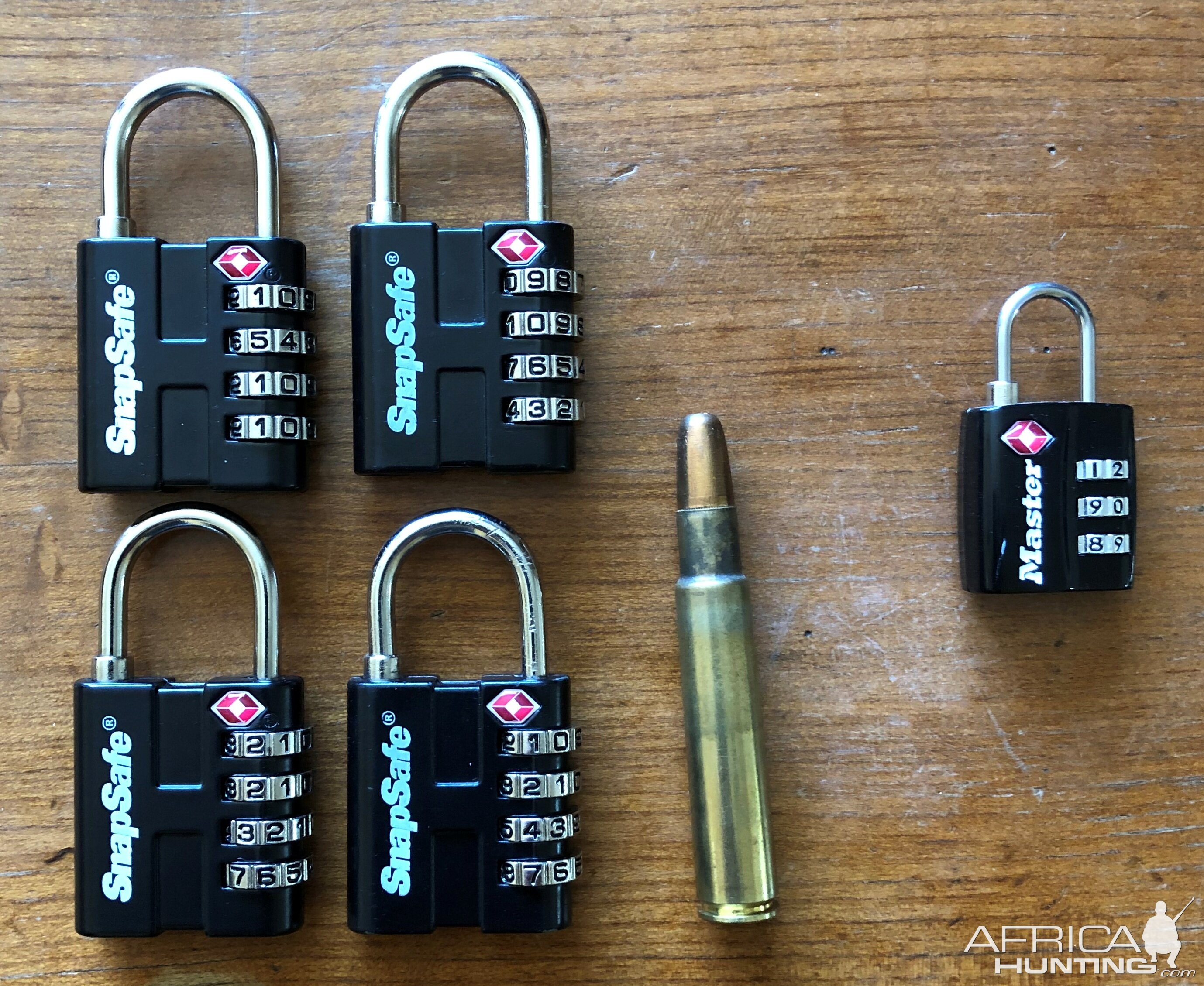 Large size TSA locks & .416 Rigby cartridge for scale