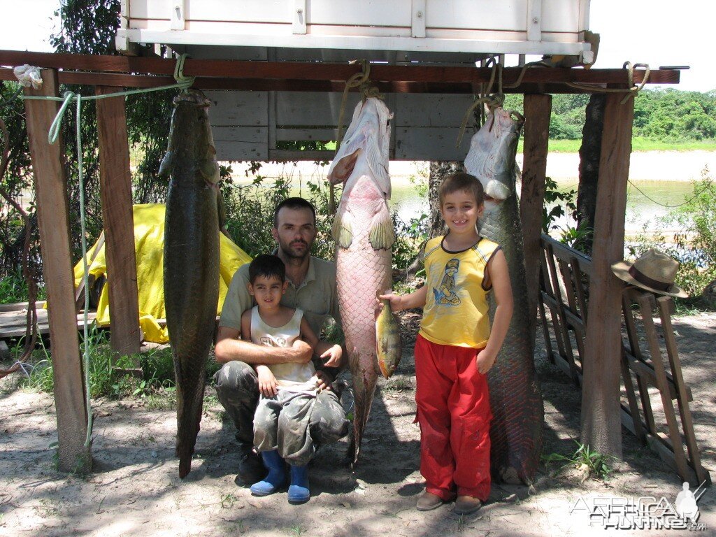 Me and my children after a fishing trip in the river Araguia, Brazil