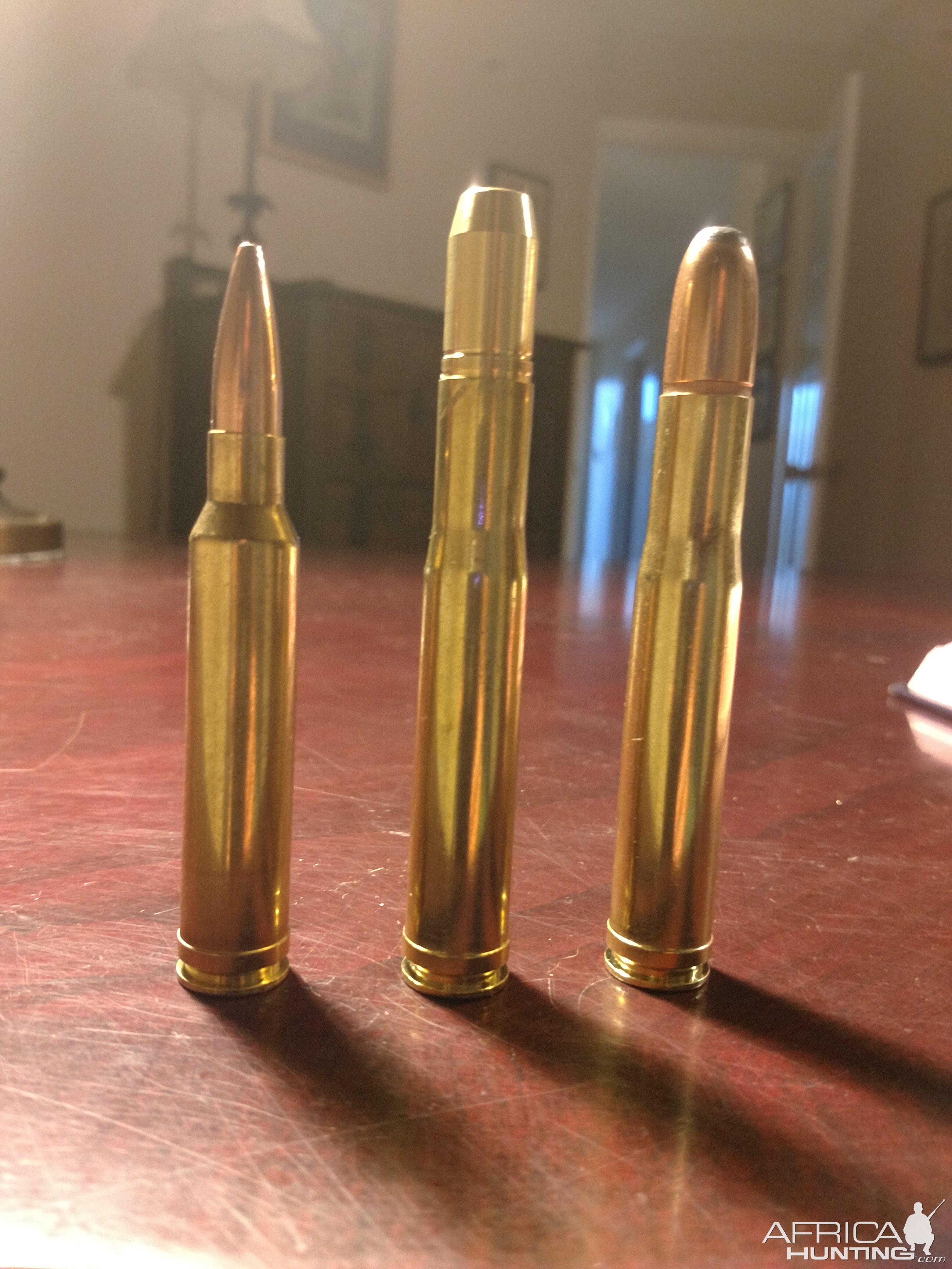 Two different loading for 400 H&H next to a 308 Norma Mag