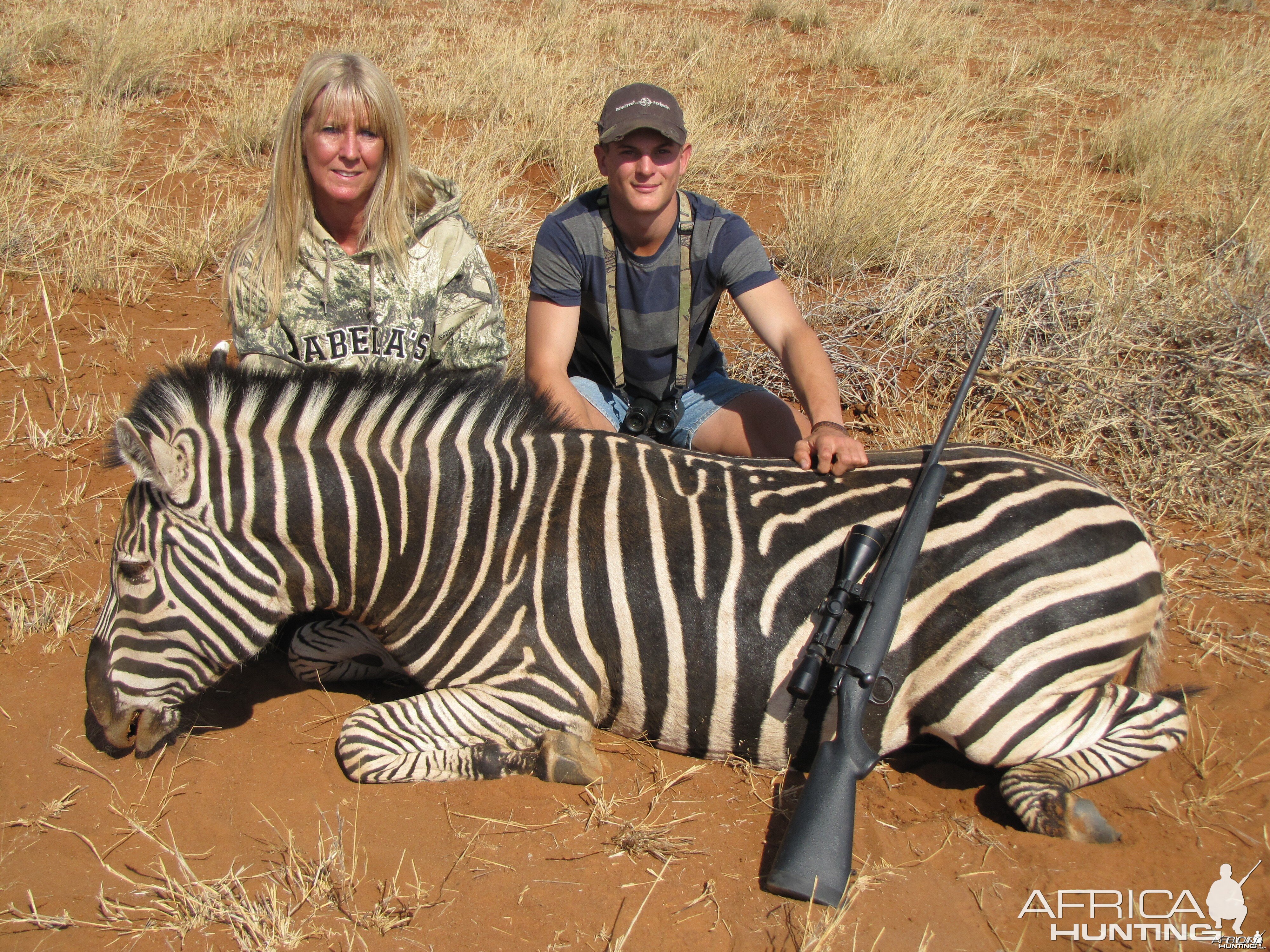 Wife and guide Brian with her zebra